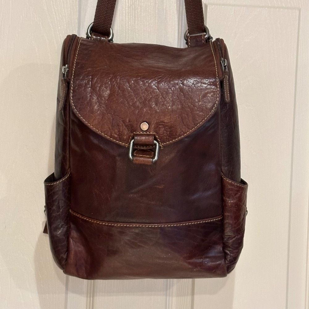 Dark Brown Leather Backpack with Striped Lining and Mesh Back Panel